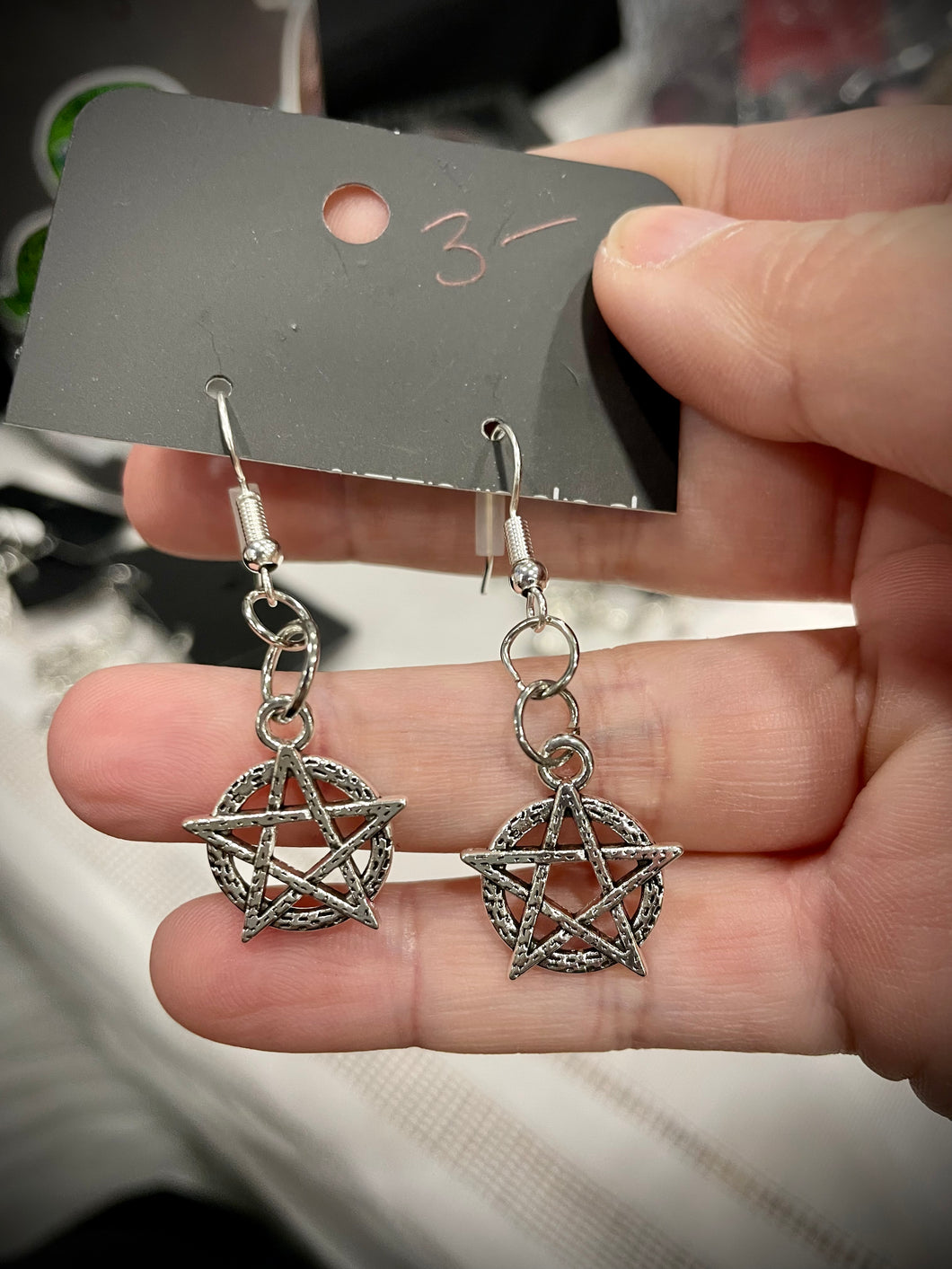 Silver pentacle earrings